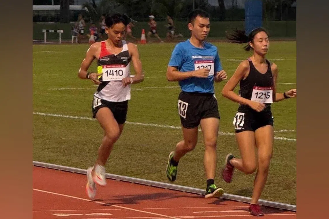 (From left) Race-winner Keane Ko with Kenneth Ho and Sherlene Ng, who were initially disqualified for a pacing infringement along with six others.