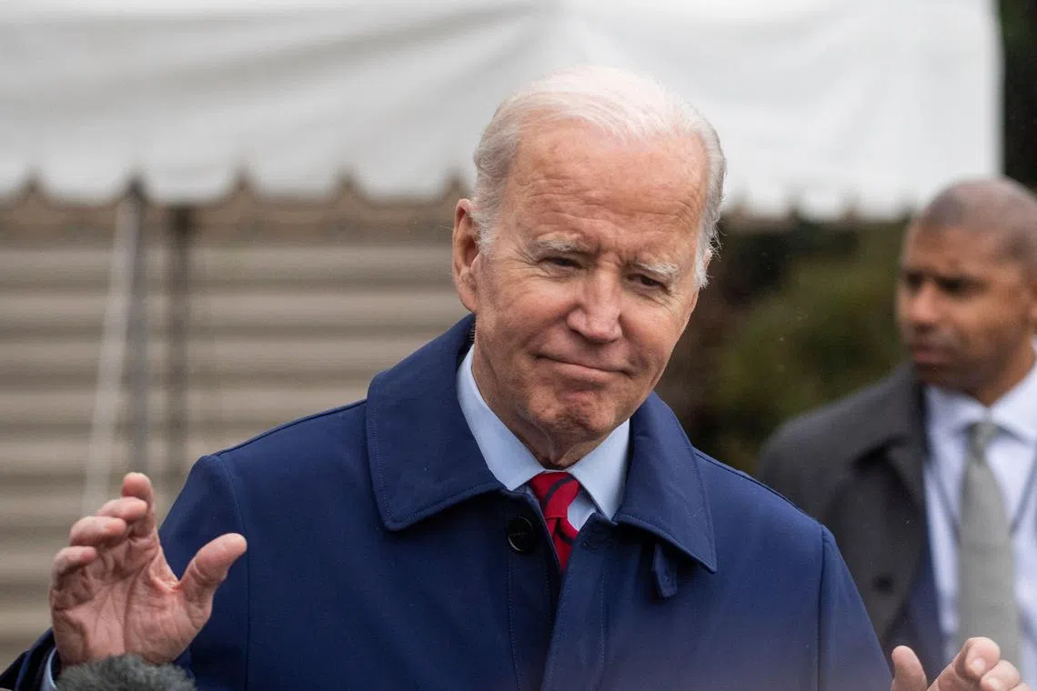 US President Joe Biden reacts to questions from journalists moments before departing from the South Lawn of the White House for Delaware, on March 3, 2023.