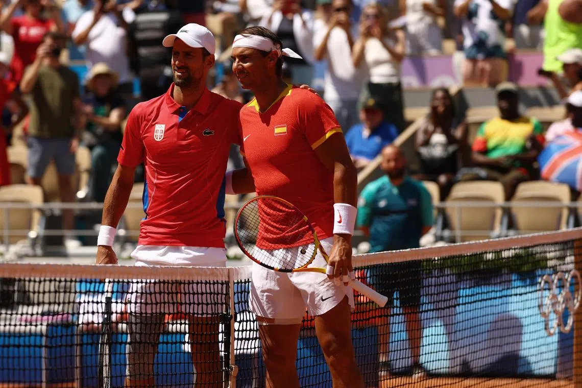FILE PHOTO: Paris 2024 Olympics - Tennis - Men's Singles Second Round - Roland-Garros Stadium, Paris, France - July 29, 2024. Rafael Nadal of Spain and Novak Djokovic of Serbia pose before their match. REUTERS/Kai Pfaffenbach/File Photo