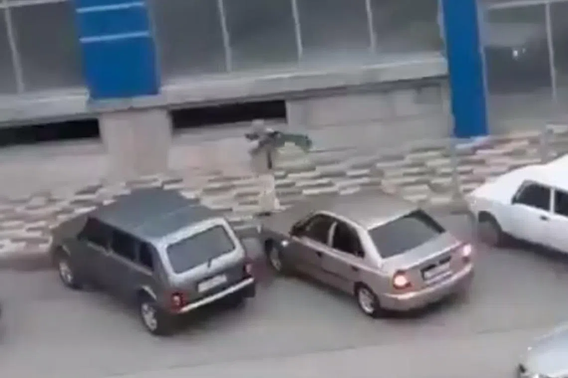 Footage circulating on social media showed a man firing as he walked down a street.