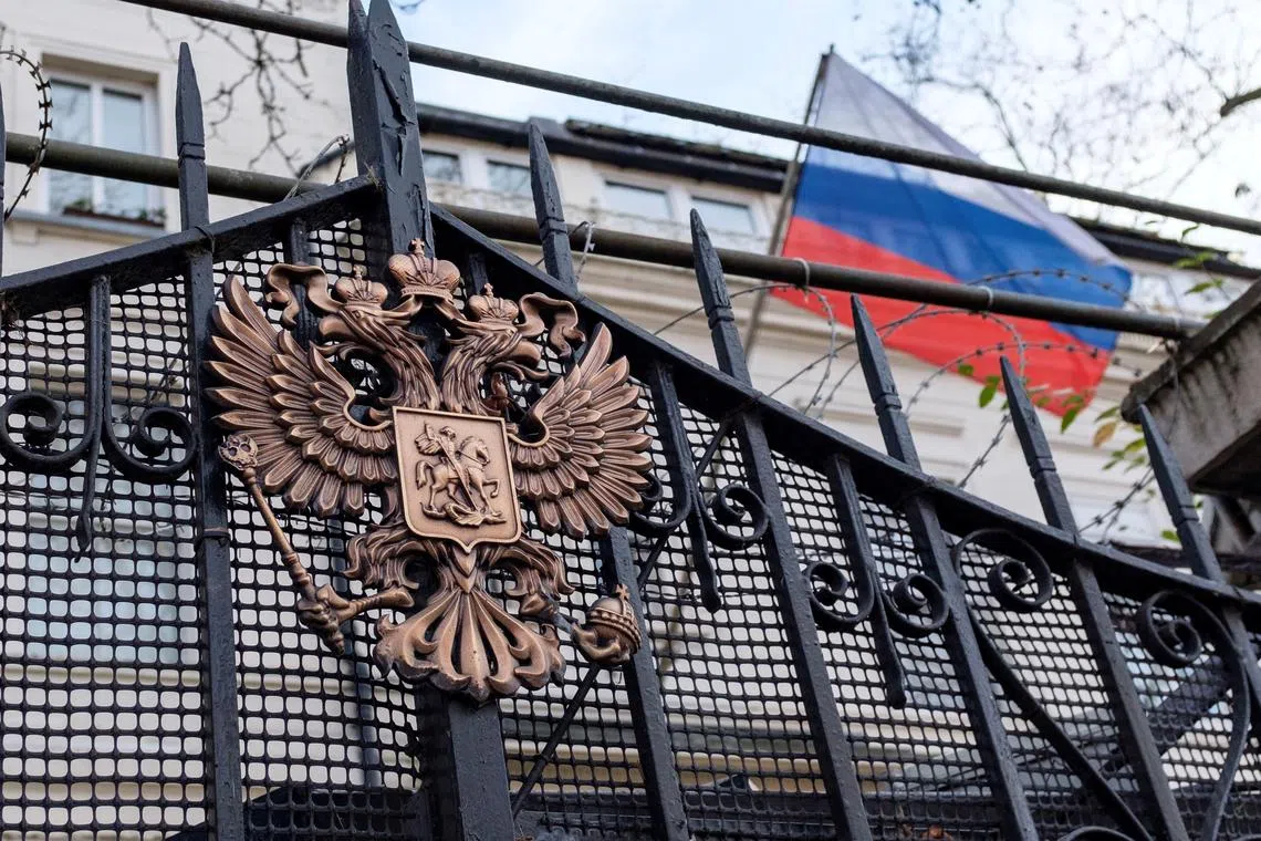 FILE PHOTO: An emblem is displayed on the gate of the Russian Embassy in London, Britain, February 12, 2022. REUTERS/May James/File Photo