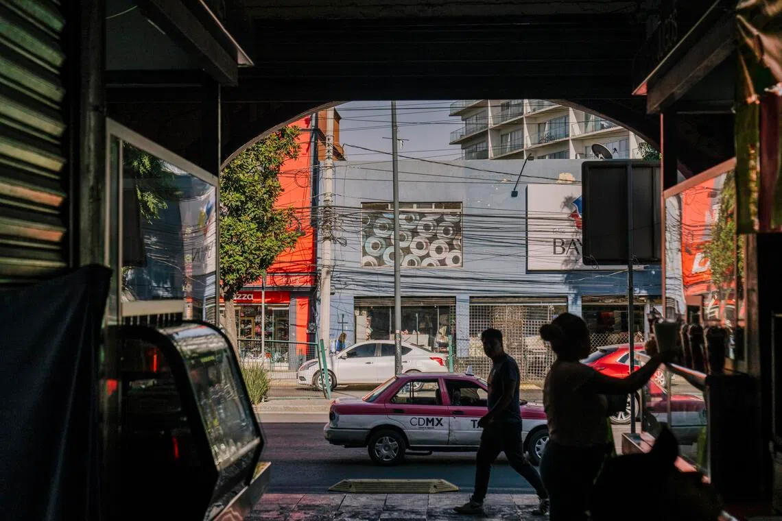 Markets like this one in the San Angel neighbourhood of Mexico City are becoming more crowded and expensive as visitors flock to them.