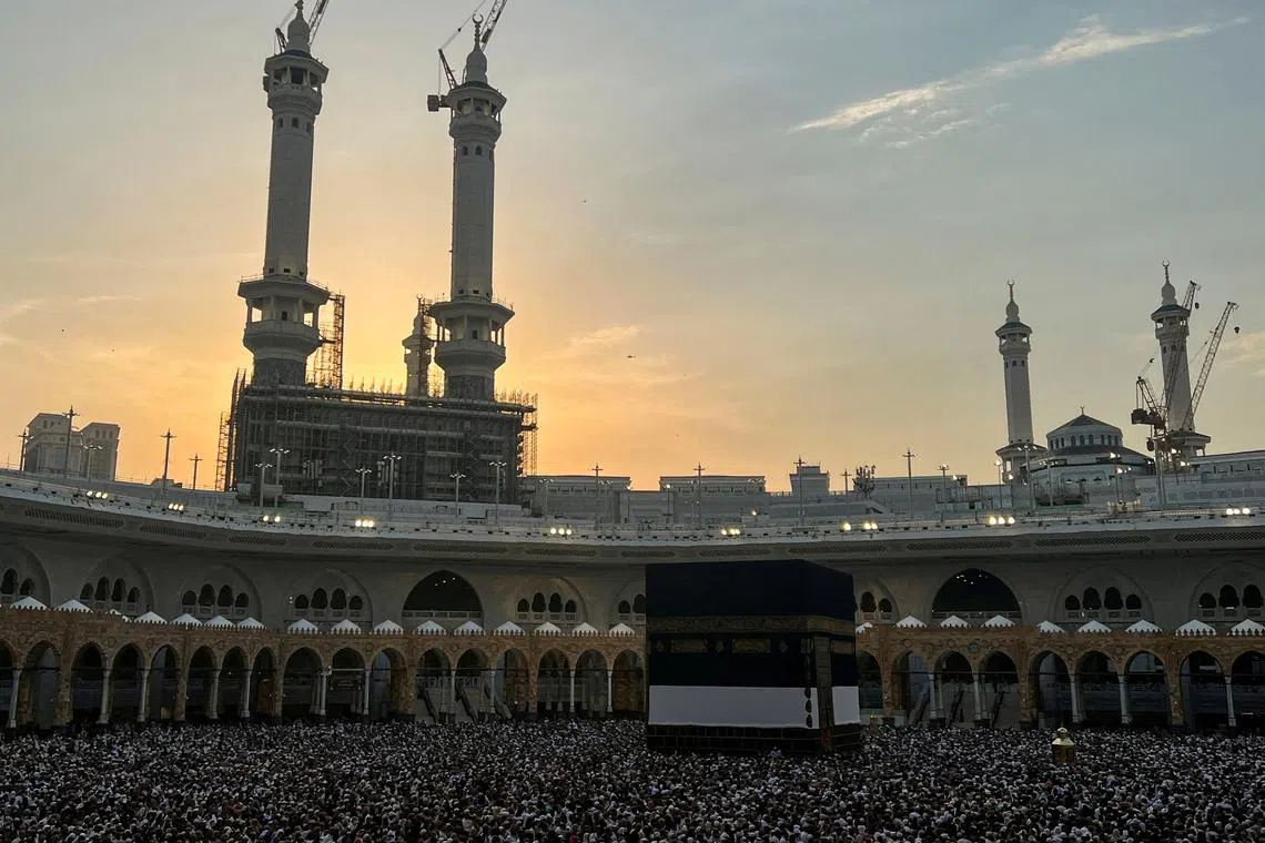 FILE PHOTO: Muslim pilgrims circle the Kaaba as they perform Tawaf at the Grand Mosque, during the annual haj pilgrimage, in Mecca, Saudi Arabia, June 18, 2024. REUTERS/Mohammed Torokman/File Photo