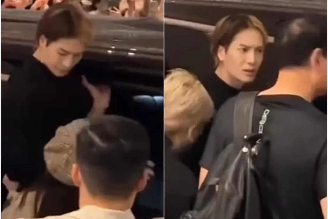 Popular Hong Kong singer Jackson Wang had a rude shock when an overzealous fan grabbed him and pulled him out of his car.