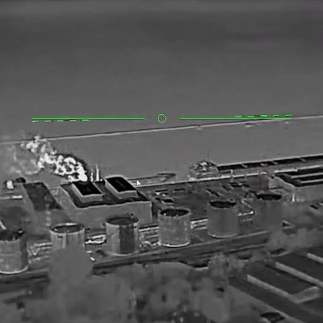 Ukrainian drones closing in on a Russian oil depot, in a screenshot from a video posted online by the Ukrainian military.