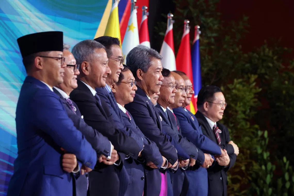 Foreign ministers of Asean and Timor-Leste, including Singapore Foreign Minister Vivian Balakrishnan (third from left), in solidarity at the Kuala Lumpur Convention Centre on July 9.