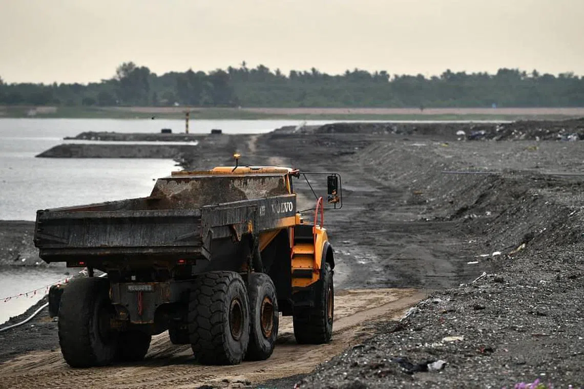 A dump truck heading back to the Transfer Station at Semakau Landfill to collect more incineration ash. Singapore's one and only landfill is estimated to be full by 2035.