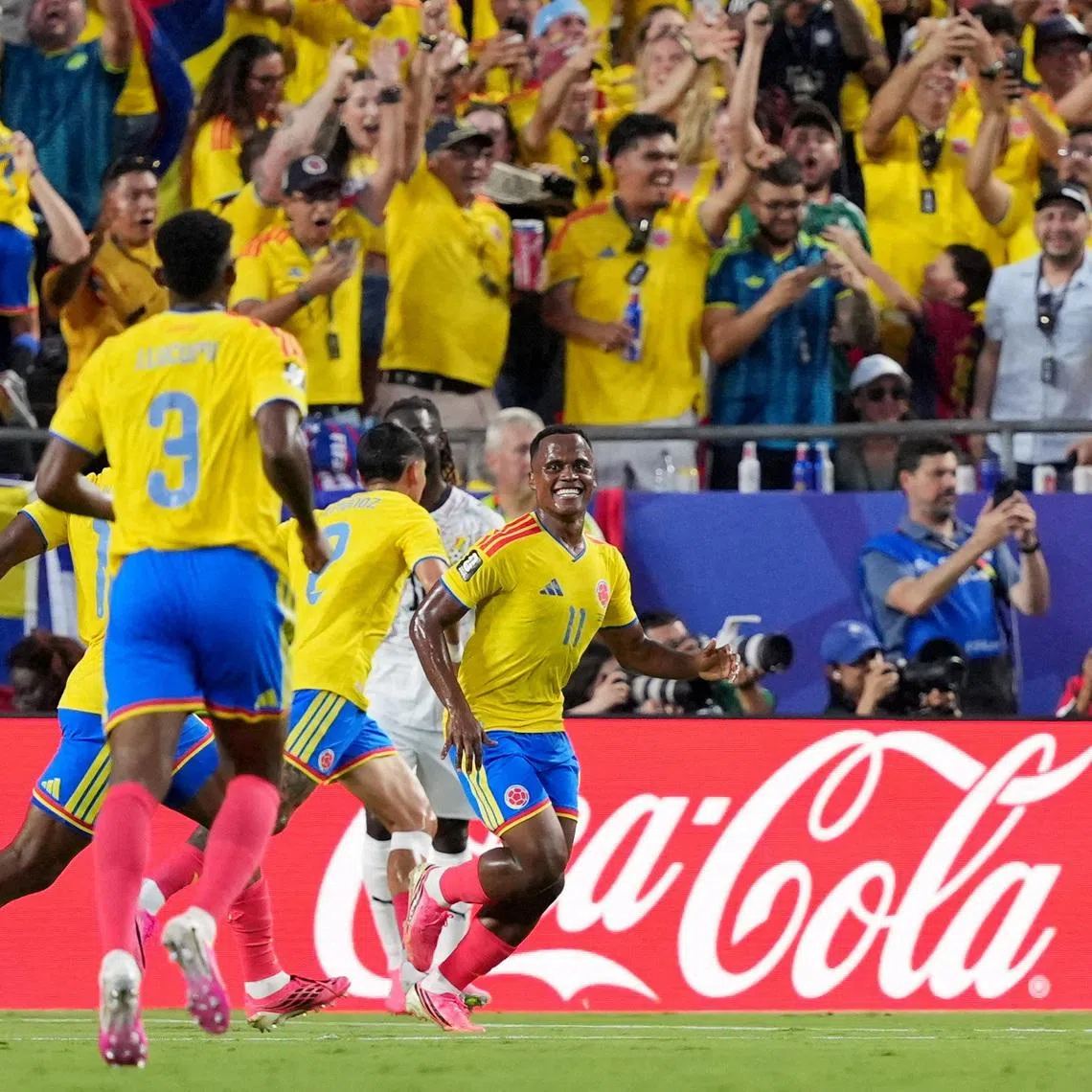 Colombia’s Jhon Arias celebrates scoring their first goal.
