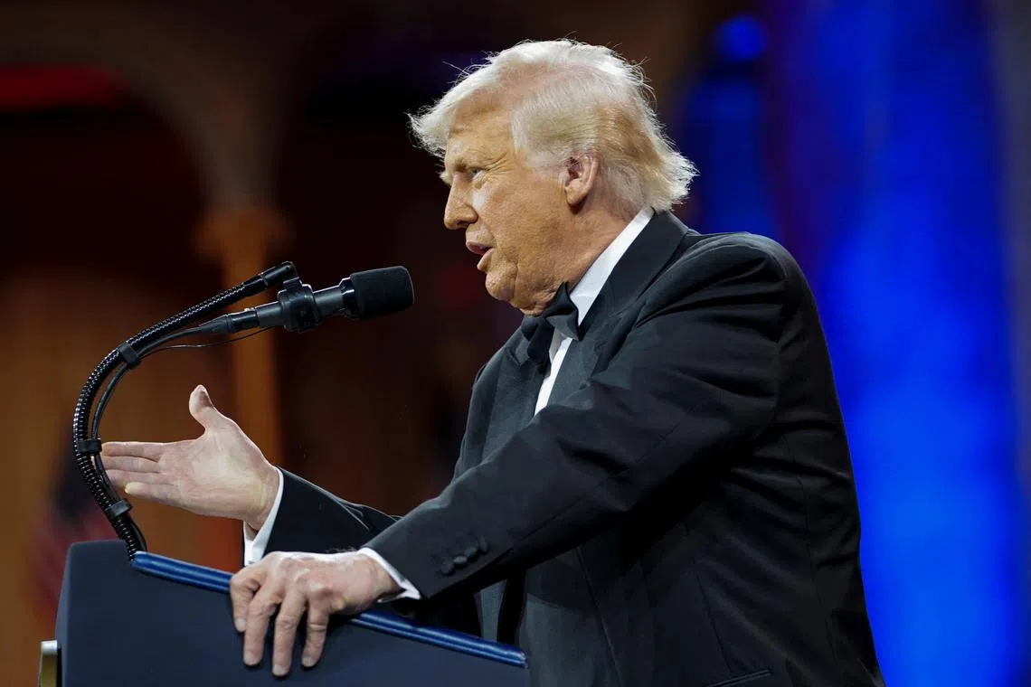 U.S. President Donald Trump speaks during the National Republican Congressional Committee (NRCC) dinner at the National Building Museum in Washington, D.C., U.S., April 8, 2025. REUTERS/Nathan Howard