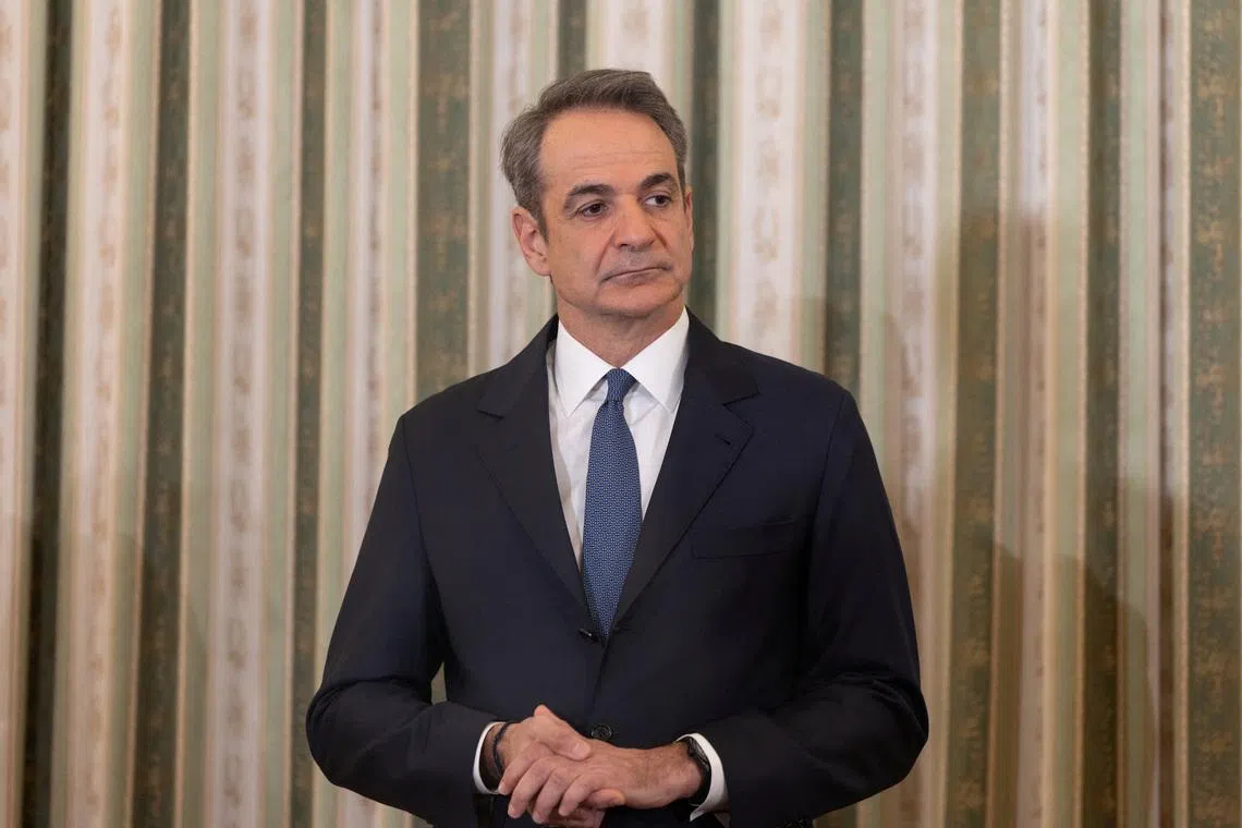 Greek Prime Minister Kyriakos Mitsotakis attends the swearing-in ceremony of newly appointed government members following a reshuffle over alleged fraud related to European Union (EU) farm funds, at the Presidential Palace in Athens, Greece, April 4, 2026. REUTERS/Stelios Misinas