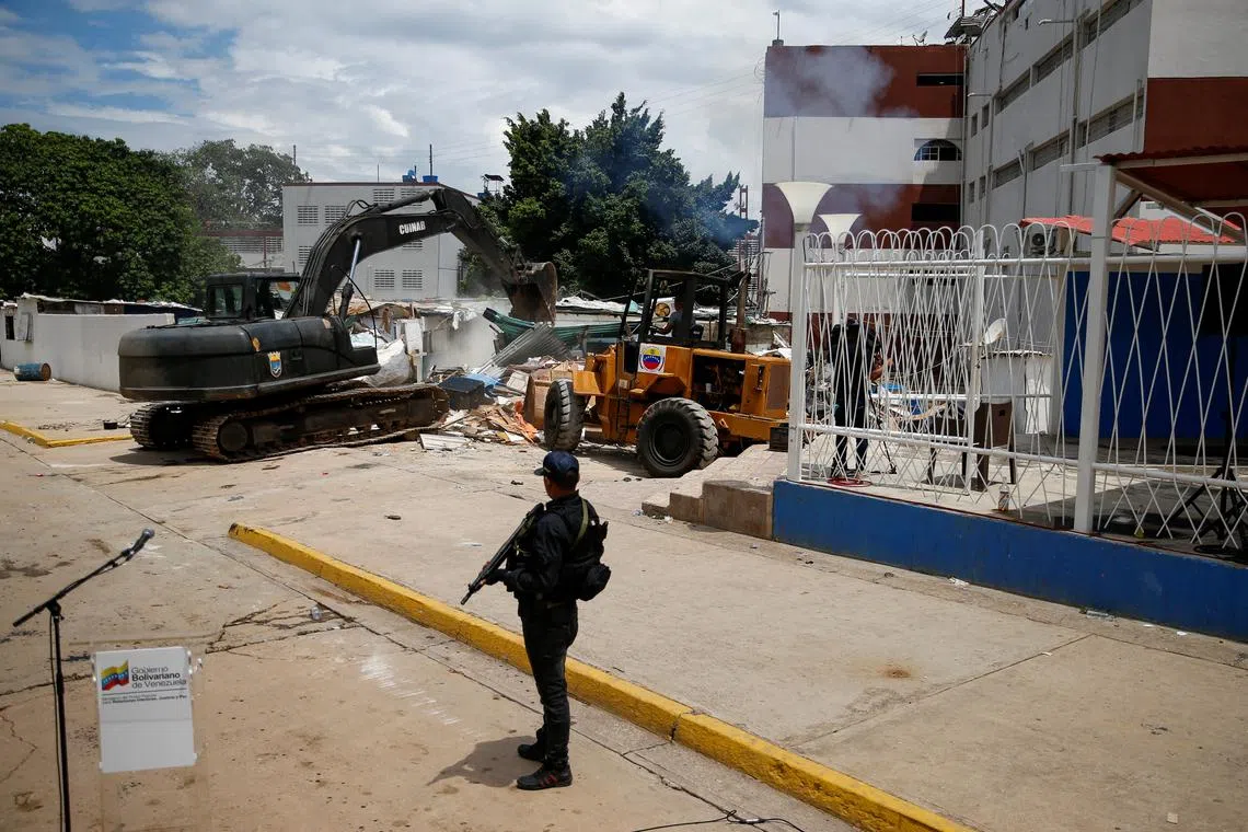 FILE PHOTO: A member of special forces of the Bolivarian National Police is pictured in the Aragua jail as Venezuela's government announced it has completed the first phase of its plan to take back control of its prison system, in Tocoron, Venezuela September 23, 2023. REUTERS/Leonardo Fernandez Viloria/File Photo