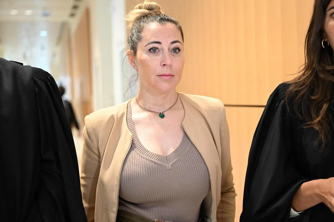 French owner of influencer Shauna Events agency, Magali Berdah arrives to attend the trial of a Belgian woman for attempting to blackmail Magali Berdah, at Paris courthouse, on May 10, 2023. The trial of a Belgian woman suspected of trying to blackmail the boss of influencers, Magali Berdah, in 2022, by trying to extract 35,000 euros from her in order not to transmit recordings to the rapper Booba, who is at war with Magali Berdah and the supposed excesses of influencers. Magali Berdah in turn accuses him of cyber harassment. (Photo by bERTRAND GUAY / AFP)