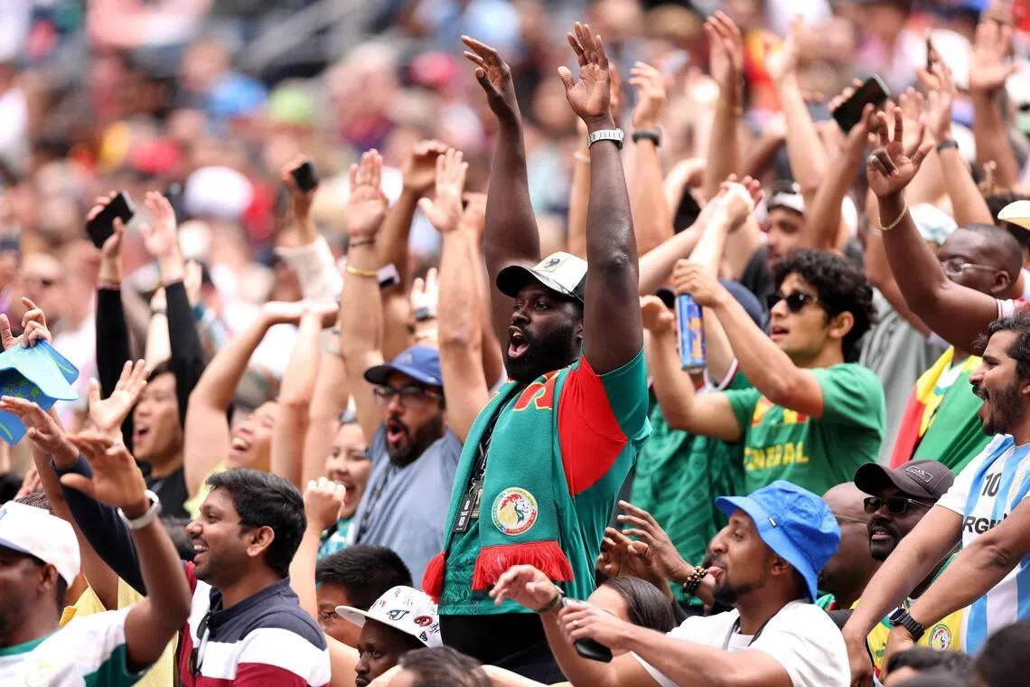 Fans of Senegal enjoy the atmosphere before match between Belgium and Senegal at Seattle Stadium on July 1.