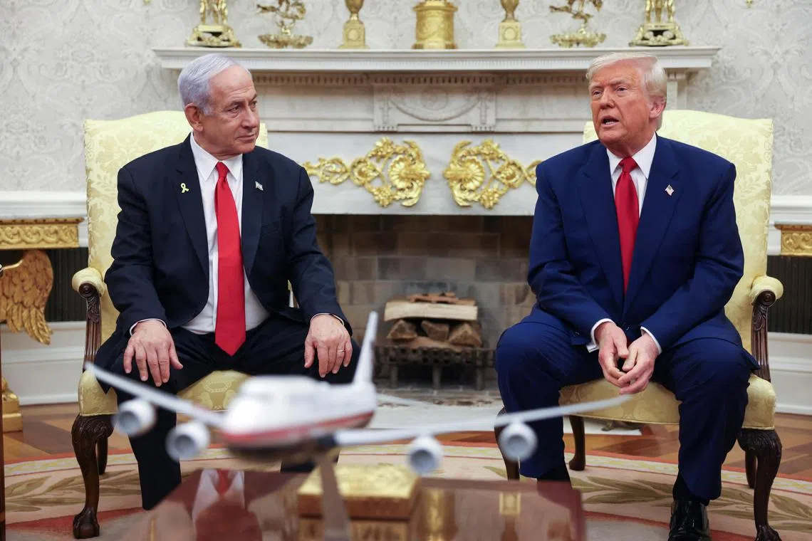 US President Donald Trump (right) meeting Israeli Prime Minister Benjamin Netanyahu at the White House on April 7.