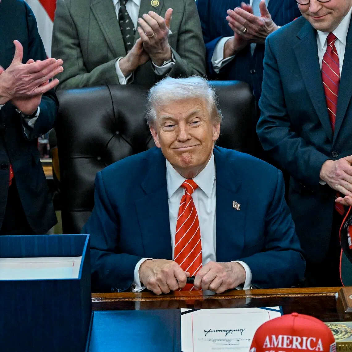 US President Donald Trump after signing a spending Bill at the White House on Feb 3.