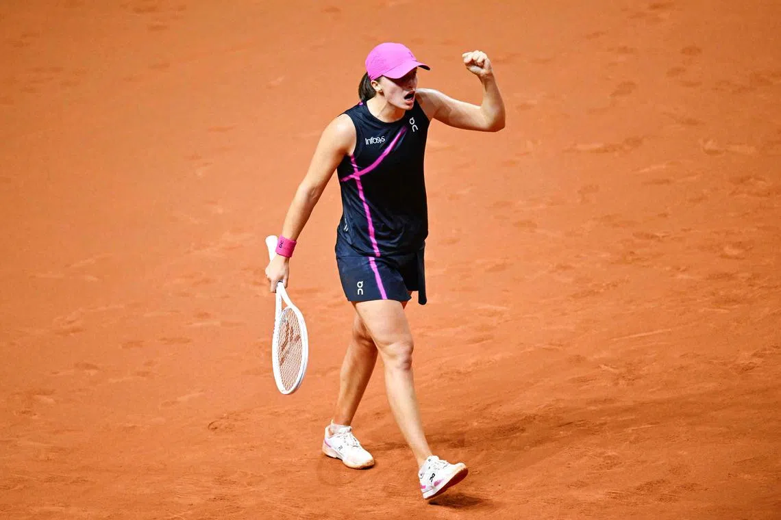 Poland’s Iga Swiatek reacts after defeating Britain’s Emma Raducanu (not in picture) during their quarter-final match at the Women's Tennis Grand Prix WTA tournament in Stuttgart, southwestern Germany, on April 19, 2024. (Photo by THOMAS KIENZLE / AFP)