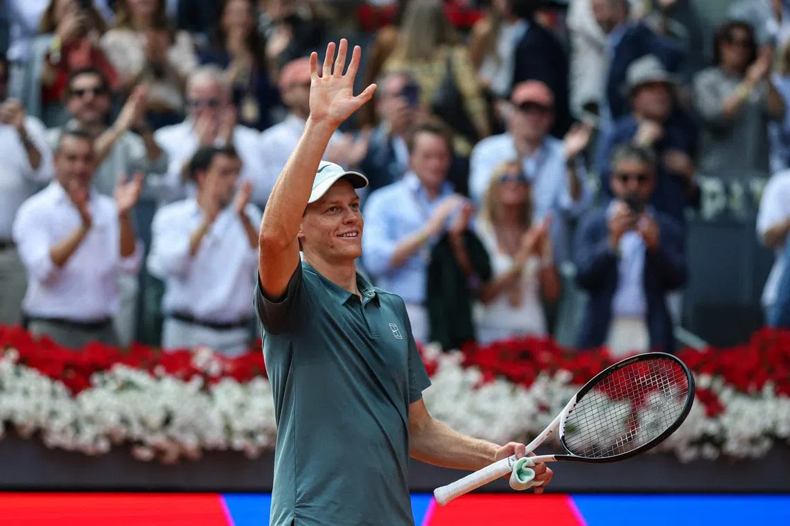 Tennis - Madrid Open - Park Manzanares, Madrid, Spain - May 1, 2026 Italy's Jannik Sinner reacts with France's Arthur Fils after winning their semi final match REUTERS/Isabel Infantes