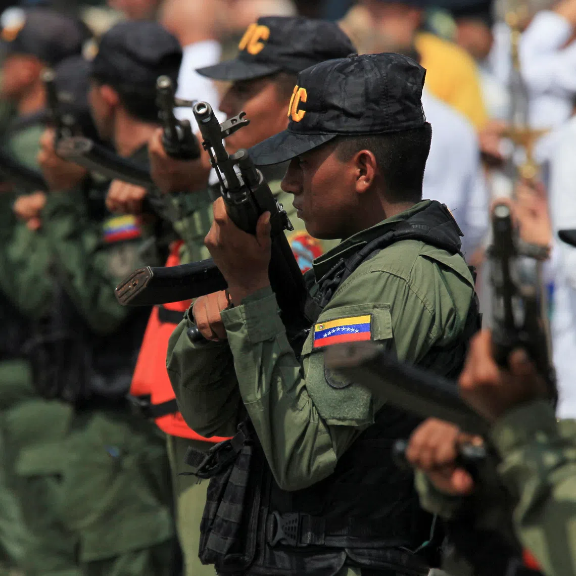 Members of Venezuela's Bolivarian National Guard stand in formation as they carry out an increased security patrol along Lake Maracaibo amid rising tensions between Venezuela and U.S., in Maracaibo, Venezuela, October 26, 2025. REUTERS/Isaac Urrutia