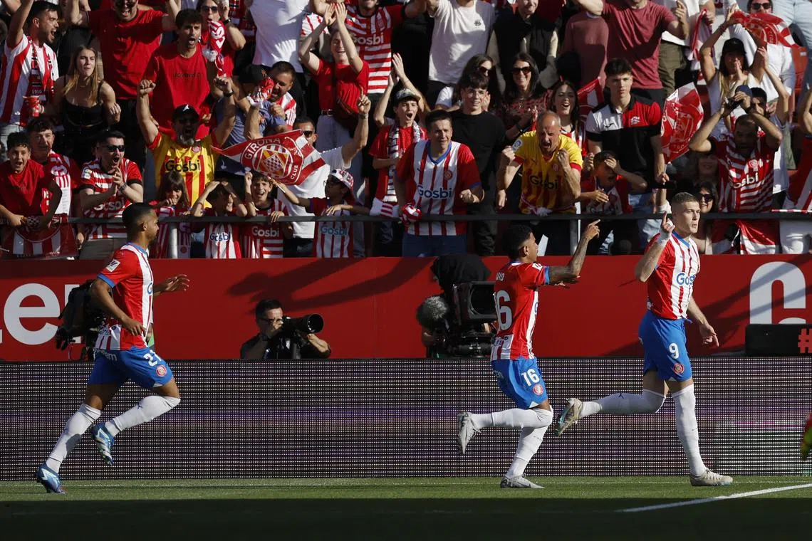 Soccer Football - LaLiga - Girona v FC Barcelona - Estadi Montilivi, Girona, Spain - May 4, 2024 Girona's Artem Dovbyk celebrates scoring their first goal with teammates REUTERS/Albert Gea/File Photo