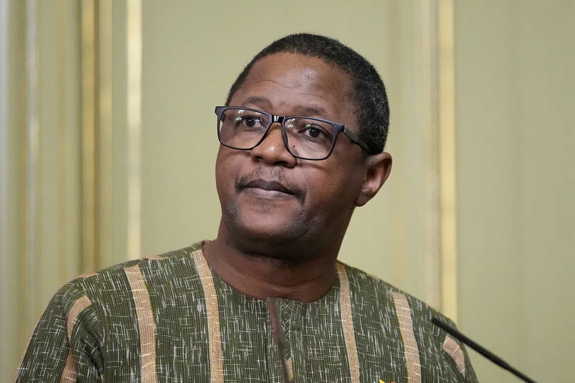 Burkina Faso Foreign Minister Karamoko Jean Marie Traore attends a joint news conference following a meeting of Russian foreign Minister Sergey Lavrov with foreign Ministers of the Confederation of Sahel States in Moscow, Russia, Thursday, April 3, 2025.     Pavel Bednyakov/Pool via REUTERS