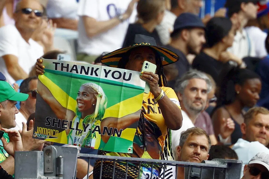 Fans holding up a sign in support of Shelly-Ann Fraser-Pryce of Jamaica at the Stade de France on Aug 2