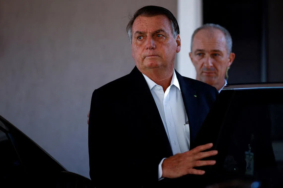 FILE PHOTO: Former Brazilian President Jair Bolsonaro leaves his home following a search operation, in Brasilia, Brazil May 3, 2023. REUTERS/Adriano Machado/File Photo