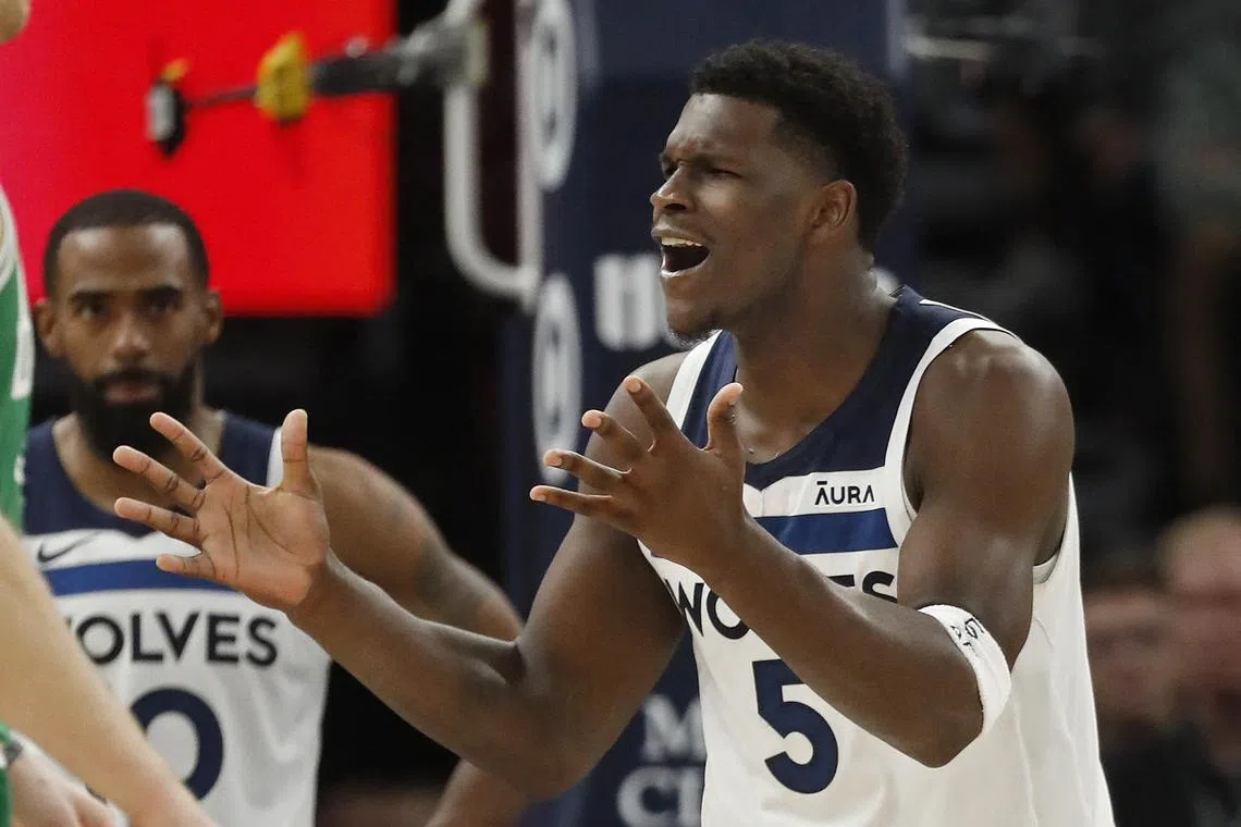 Minnesota Timberwolves guard Anthony Edwards reacting to a called foul in the fourth quarter at Target Centre during his team's 114-109 overtime win over the Boston Celtics.