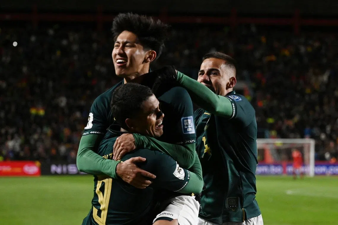 Soccer Football - World Cup - CONMEBOL Qualifiers - Bolivia v Brazil - Estadio Municipal El Alto, El Alto, Bolivia - September 9, 2025 Bolivia's Miguel Terceros celebrates scoring their first goal with teammates REUTERS/Claudia Morales