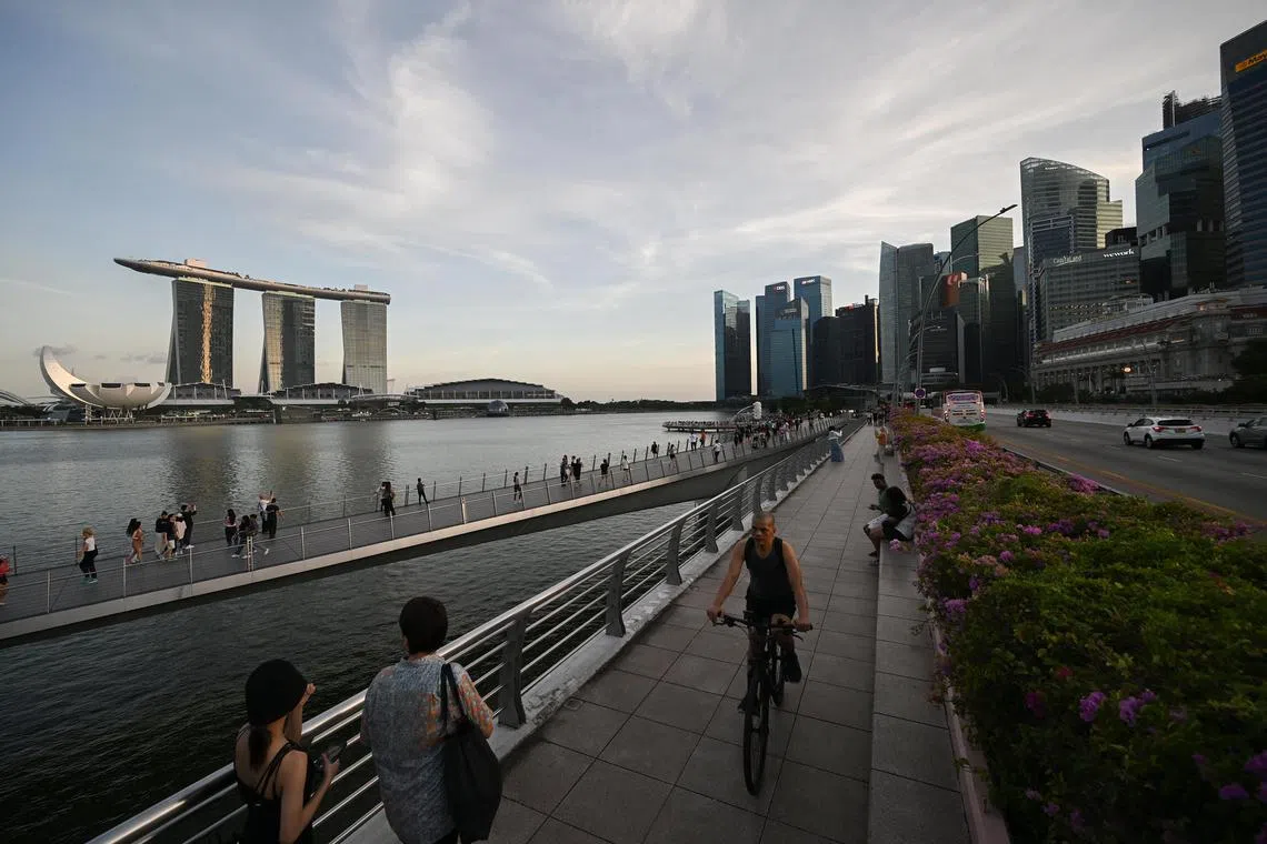 ST20240228_202478689815 pixgeneric Azmi Athni// Generic of Singapore's city skyline during sunset on Feb 28 Can be used for: Business; CBD; population; work; tourism; employment; traffic; GST; Singapore ST PHOTO: AZMI ATHNI