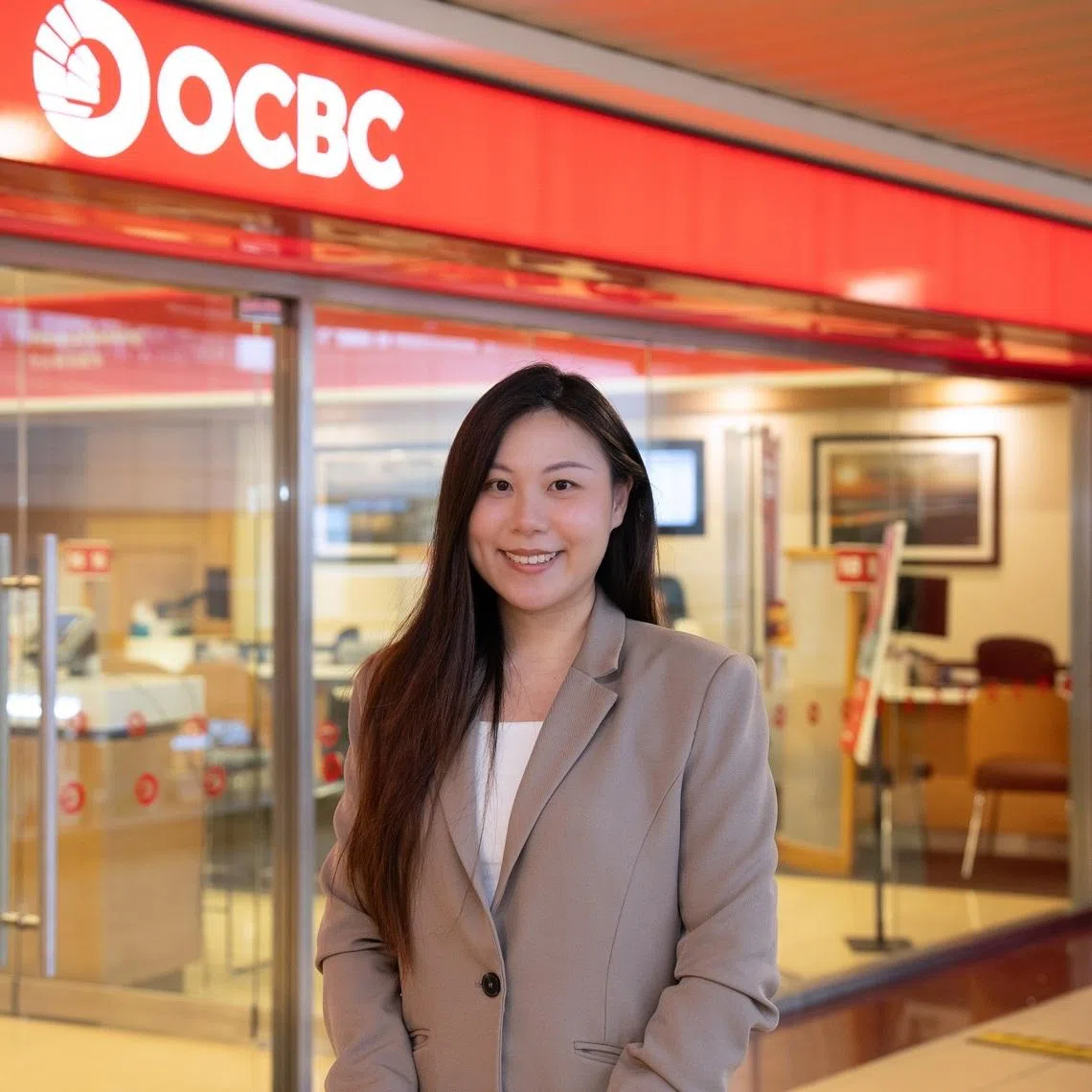 OCBC wealth adviser Ng Zuolin says the Gen AI training programme has improved how she engages customers.
