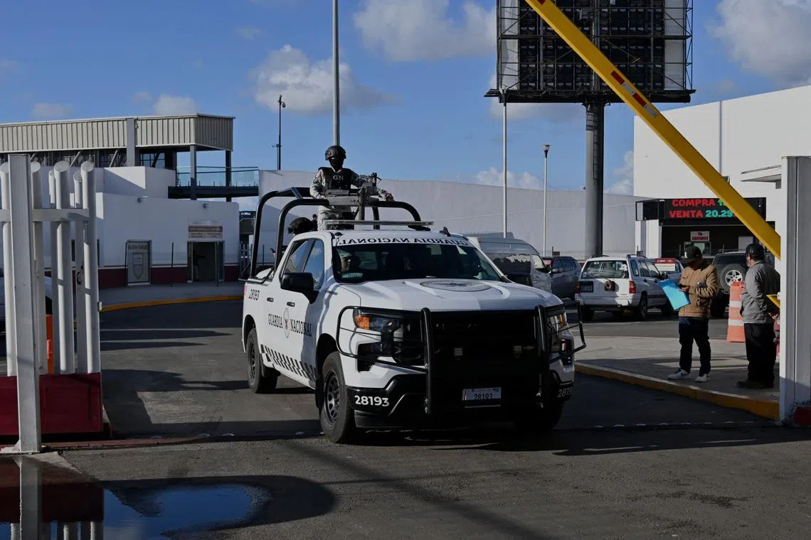 A member of the Mexican National Guard patrols the US-Mexico Chaparral border crossing in Tijuana, Baja California, Mexico, on Jan. 27, 2025. 