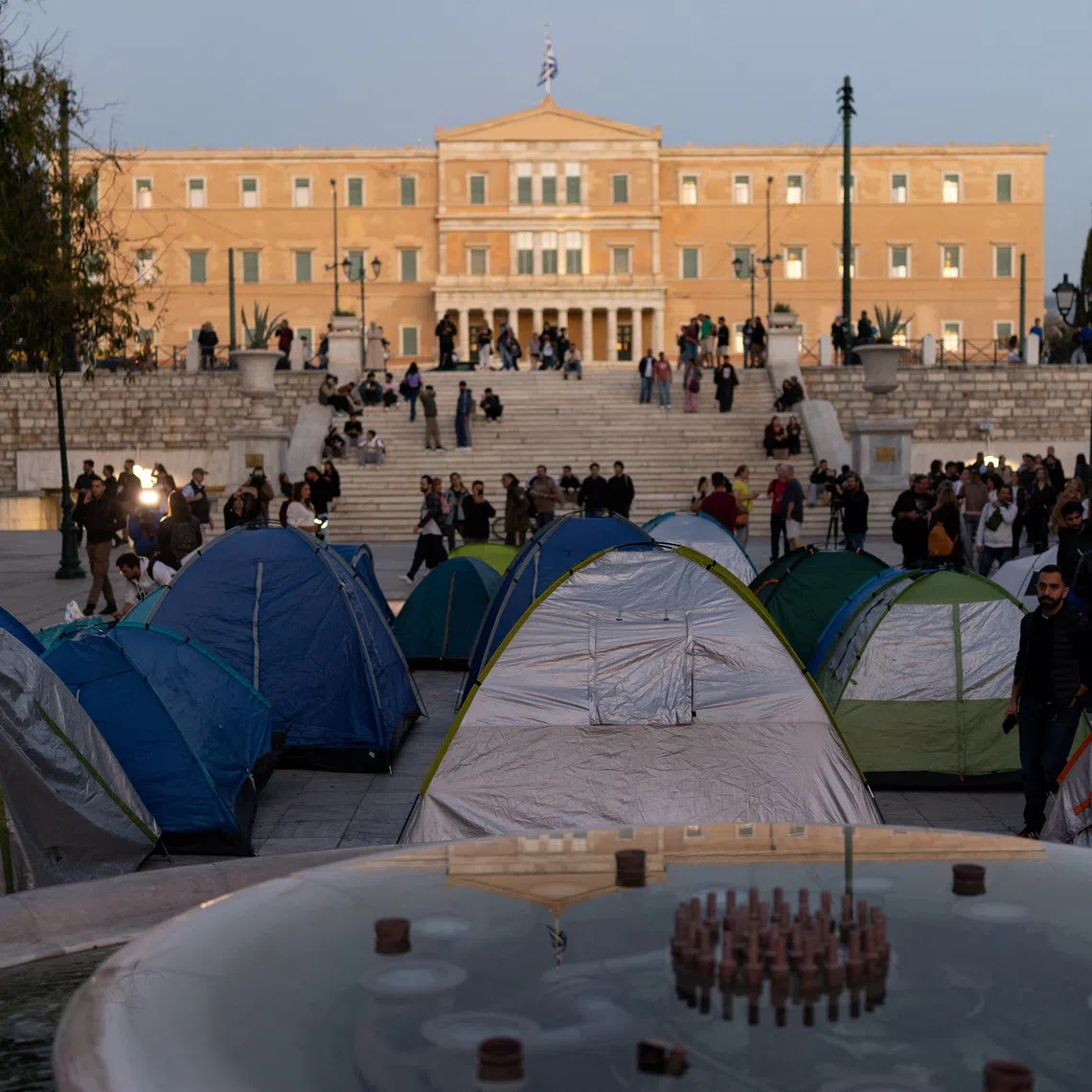 Tents are set up in Syntagma Square in front of the Greek Parliament during an overnight protest against rising housing costs and underfunded education, in solidarity with students in France and Spain, in Athens, Greece, October 20, 2026. REUTERS/Stelios Misinas