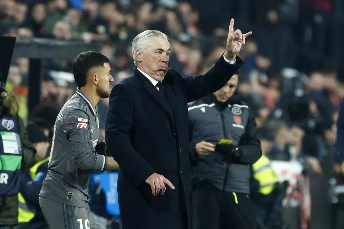 Real Madrid coach Carlo Ancelotti gestures during the Spanish La Liga match against Rayo Vallecano which ended 3-3.