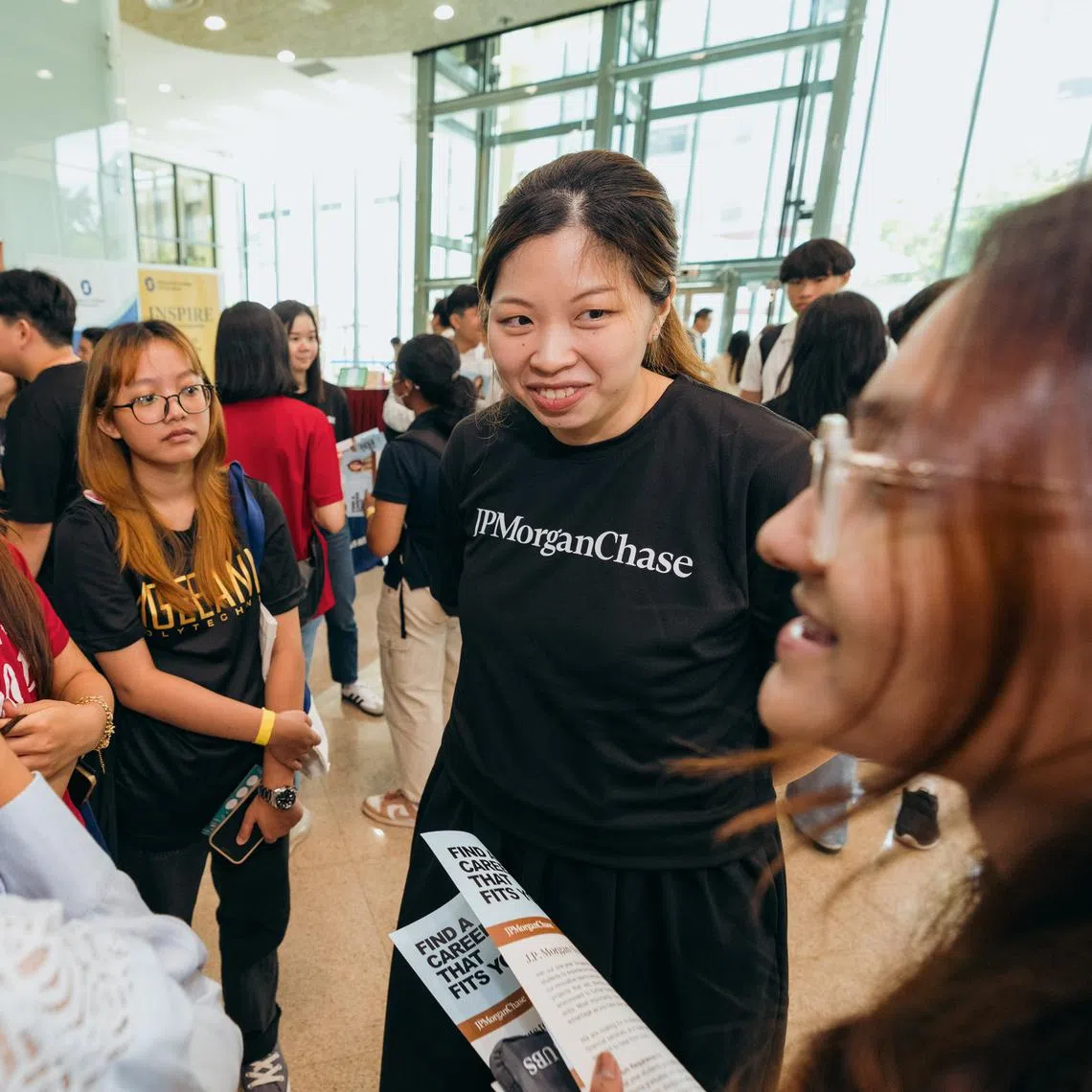 Ms Maggie Tan, a former apprentice in JP Morgan who was promoted to the grade of vice-president. 