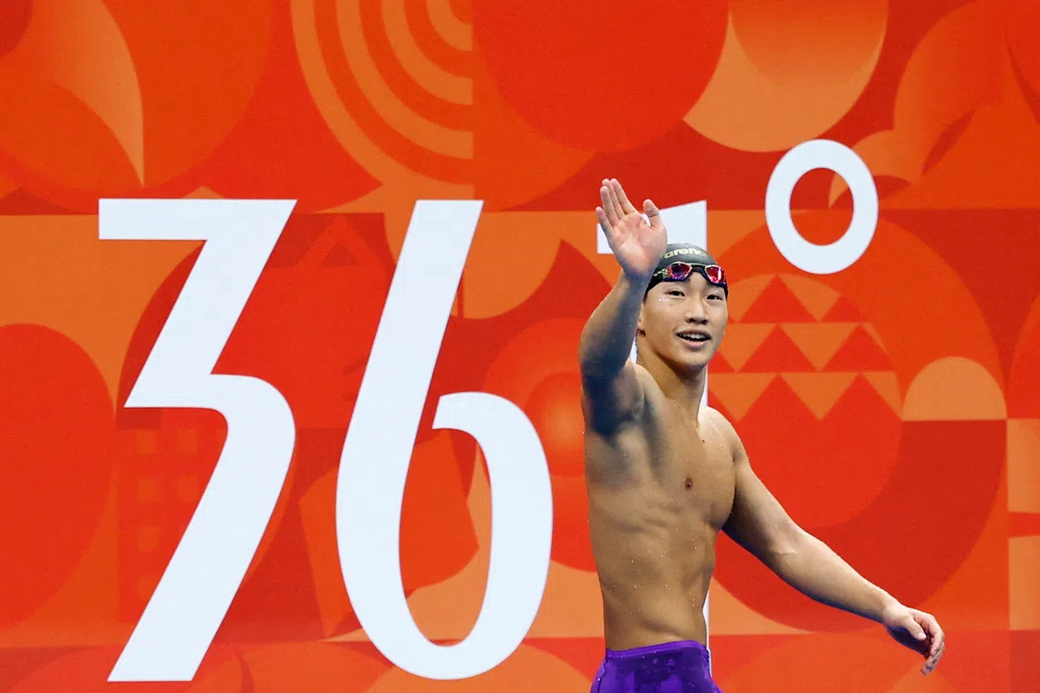 Asian Games - Aichi-Nagoya 2026 - Swimming - Tokyo Aquatics Centre, Koto, Tokyo, Japan - September 24, 2026 Japan's Shin Ohashi celebrates winning gold in the Men's 200m Breaststroke Final REUTERS/Manami Yamada