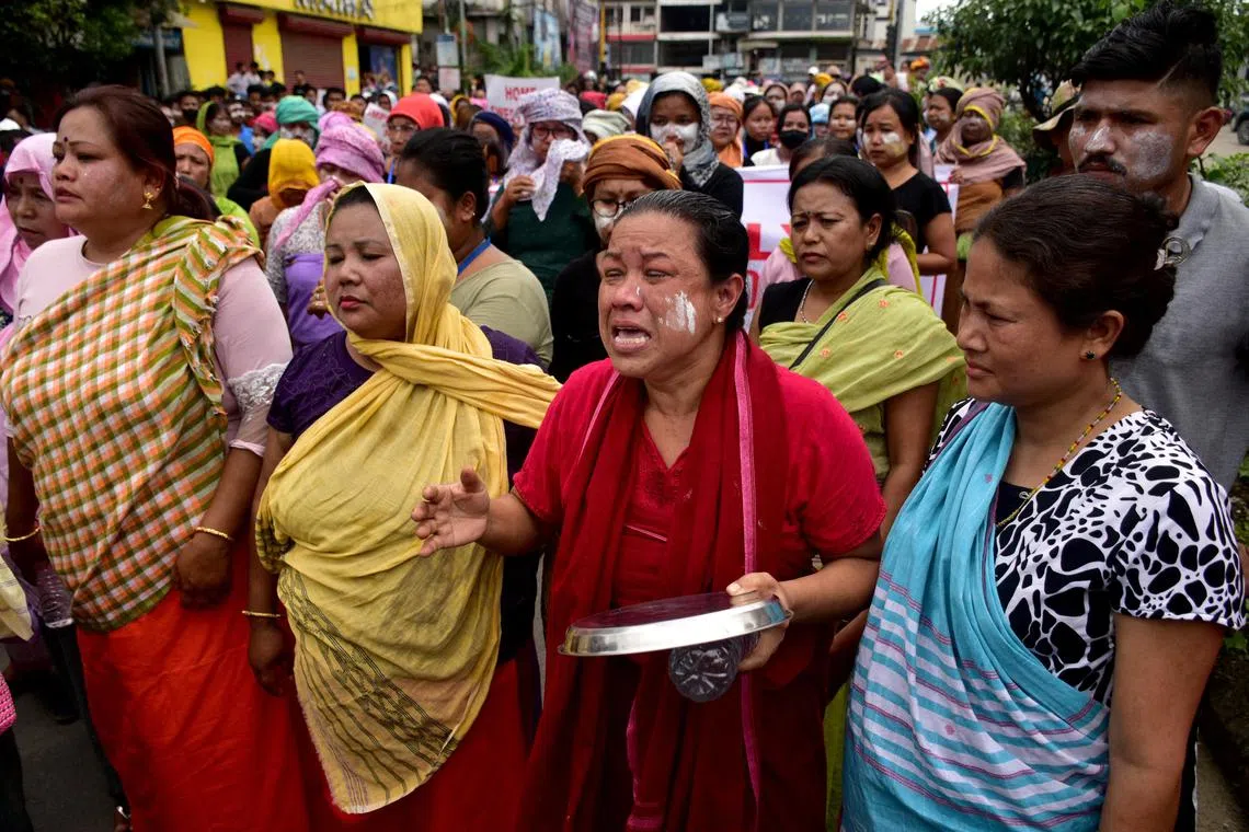 Internally displaced persons (IDPs), who are living in relief camps, react during a protest rally demanding their resettlement in their native places, in Imphal, Manipur, India, on Aug 1. 
