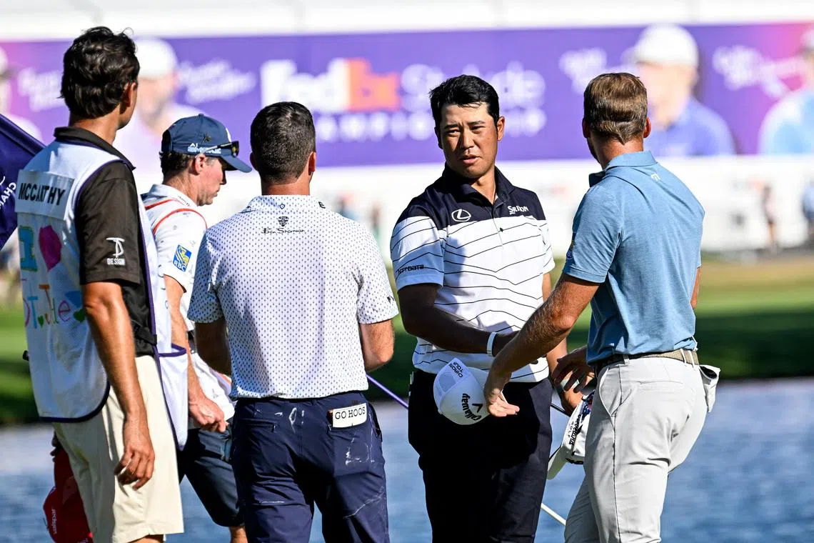 Dennis McCarthy, Hideki Matsuyama and Sam Burns shake hands after their third round at the St. Jude Championship on Aug 17, 2024.
