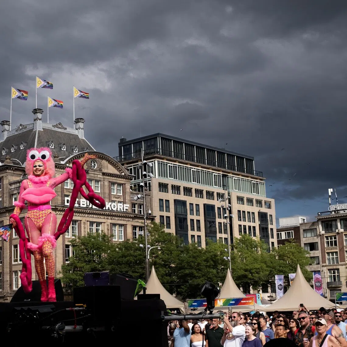 People taking part in a WorldPride street party at Dam Square in Amsterdam on July 31. This year marks the 30th anniversary of Pride Amsterdam and the 10th edition of WorldPride.