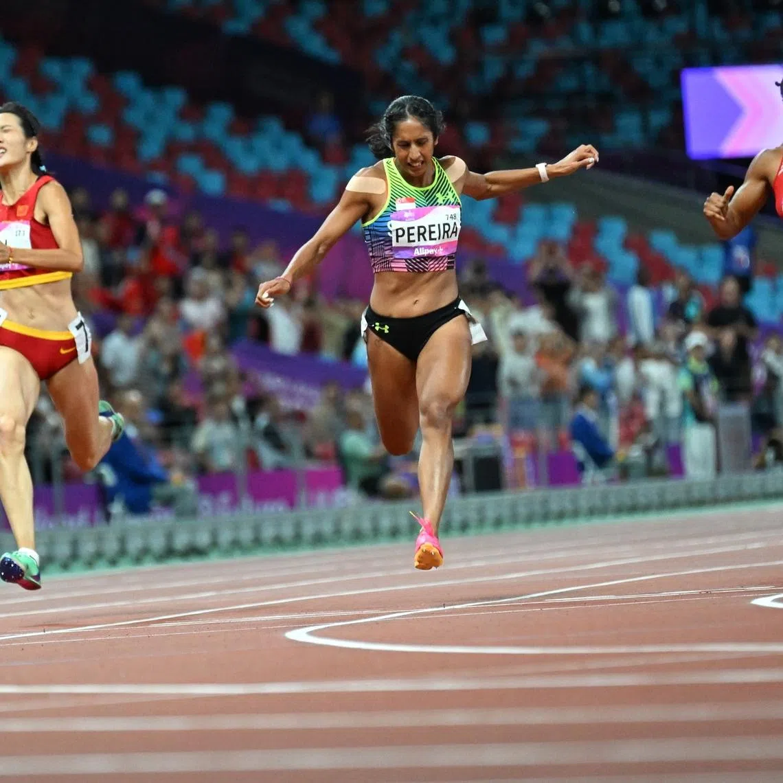 Singapore sprinter Shanti Pereira bringing the gold home for Singapore in the women's 200m final at the Asian Games 2023 in Hangzhou.