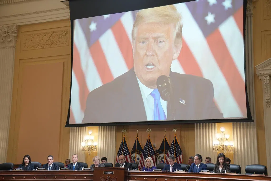 A screen displays a photo of former President Donald Trump during the last public meeting of the House committee investigating the January 6 attack on the U.S. Capitol, in Washington on Monday, Dec. 19, 2022. Tom Marino, one of the first members of Congress to support Trump, now says the G.O.P. “has to do whatever it has to do” to get away from him. (Haiyun Jiang/The New York Times)
