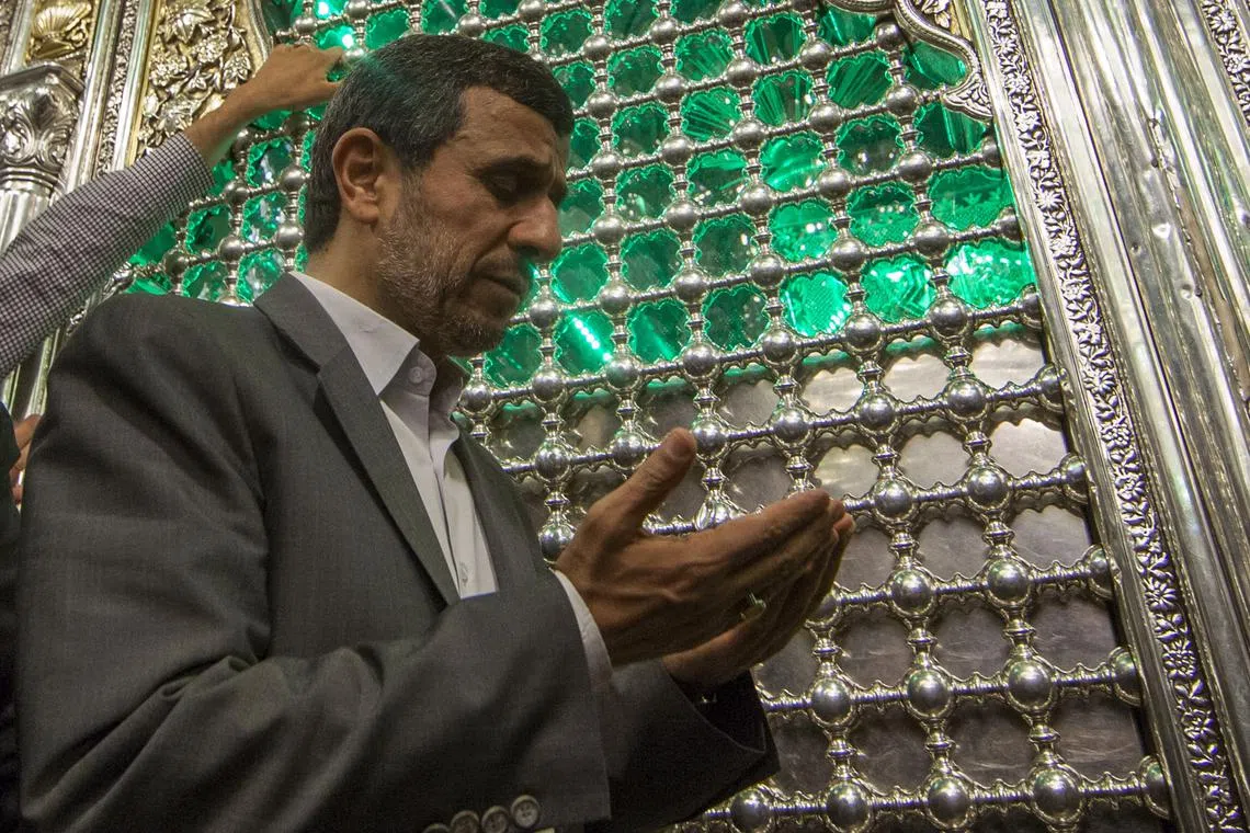 FILE PHOTO: Iranian President Mahmoud Ahmadinejad visits the holy shrine of Imam Abbas in Kerbala, 110 km (68 miles) south of Baghdad, July 19, 2013. REUTERS/ Ahmed al-Husseini /Pool/File photo
