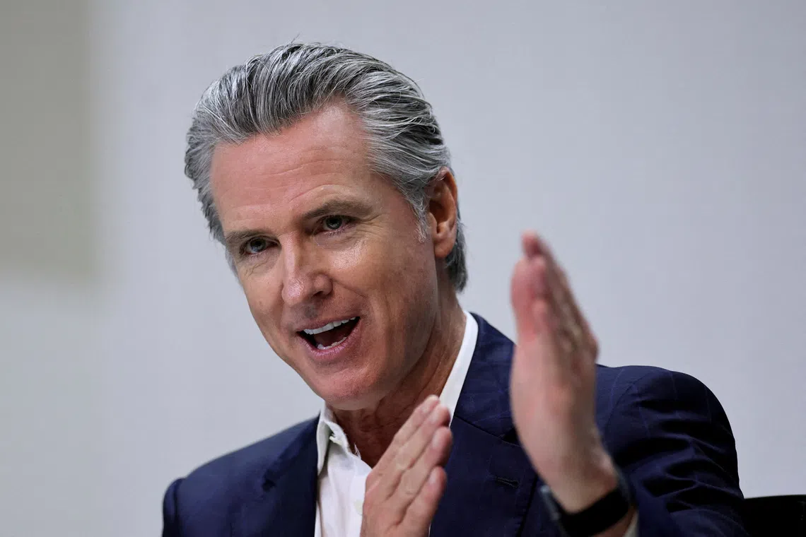 FILE PHOTO: California Governor Gavin Newsom gestures as he attends a press conference, during the UN Climate Change Conference (COP30), in Belem, Brazil, November 11, 2025. REUTERS/Adriano Machado/File Photo