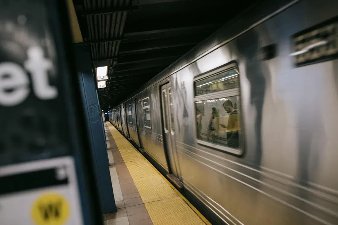 The woman fell into the subway tracks after her head hit the train.