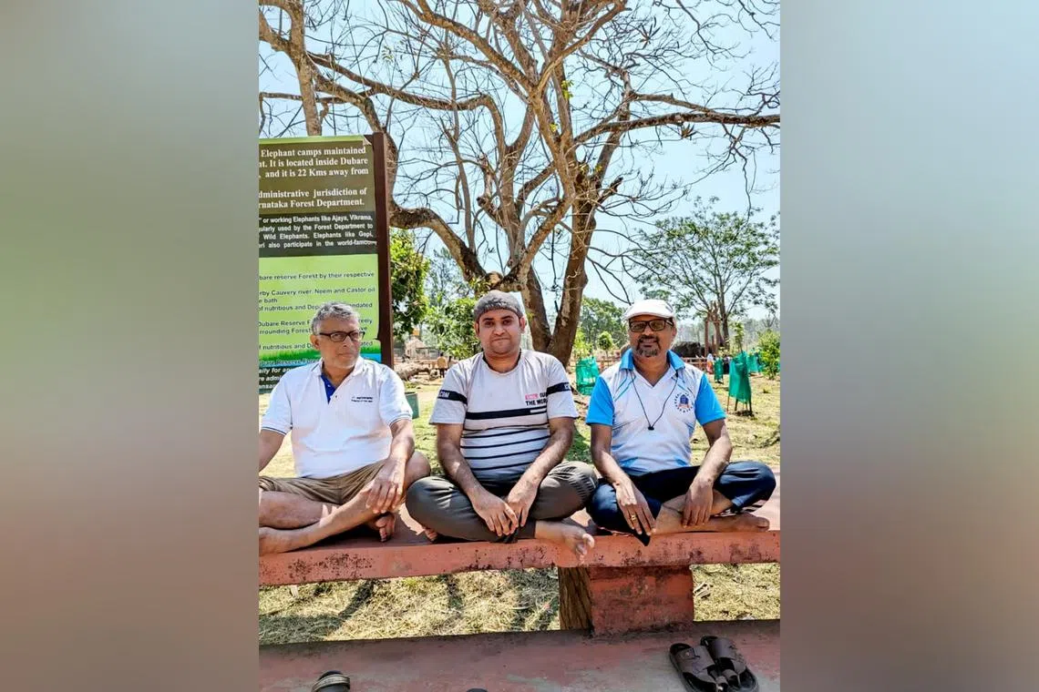 Late Bengaluru techie Atul Subhash (centre), who died by suicide in Dec, with activists like Anil Kumar (right) on a trip to Dubbare national park in Karnataka, India.