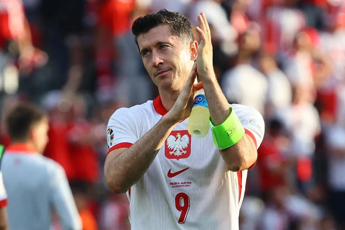 FILE PHOTO: Soccer Football - Euro 2024 - Group D - Poland v Austria - Berlin Olympiastadion, Berlin, Germany - June 21, 2024 Poland's Robert Lewandowski looks dejected after the match REUTERS/Fabrizio Bensch/File Photo