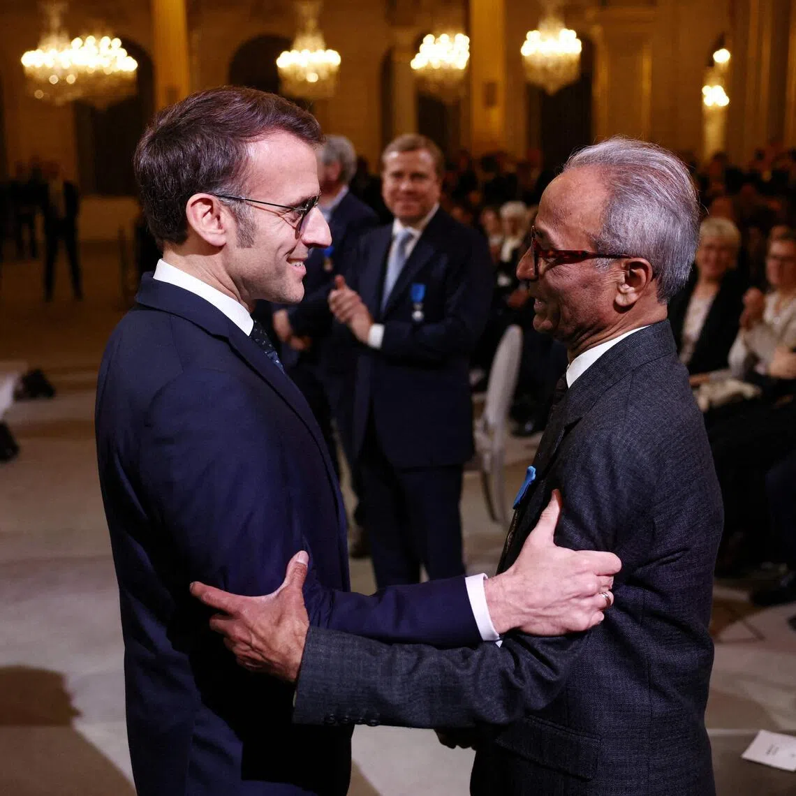 French President Emmanuel Macron praised Pakistan-born newspaper hawker Ali Akbar Akbar, 73, as an example of integration which “makes our country stronger and prouder”.