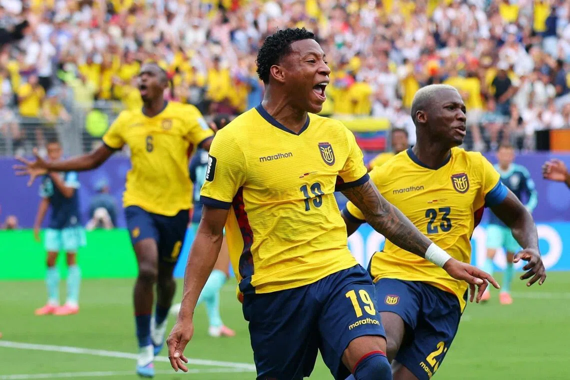Gonzalo Plata celebrates scoring the winning goal for Ecuador against Germany on June 25 with Moises Caicedo.
