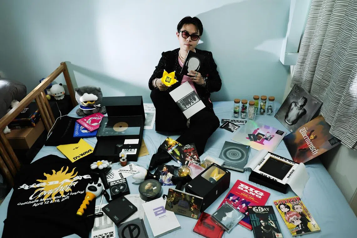 Breaking the mould in a predominantly female fanbase, Danny Wee is routinely first in line for new merch drops. His extensive collection spans multiple generations of lightsticks, including the rare 20th-anniversary edition, and now requires its own dedicated cabinet.