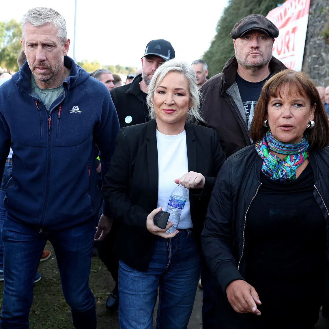 Northern Ireland First Minister, Michelle O'Neill and Sinn Fein president Mary Lou McDonald arrive at a protest against an Orange Order parade on the Garvaghy Road, in Portadown, Northern Ireland, October 3, 2026. REUTERS/Cathal McNaughton