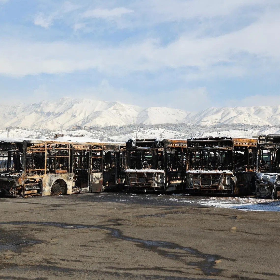 Buses that were burned during Iran's protests, in Tehran, Iran, January 21, 2026. Majid Asgaripour/WANA (West Asia News Agency) via REUTERS